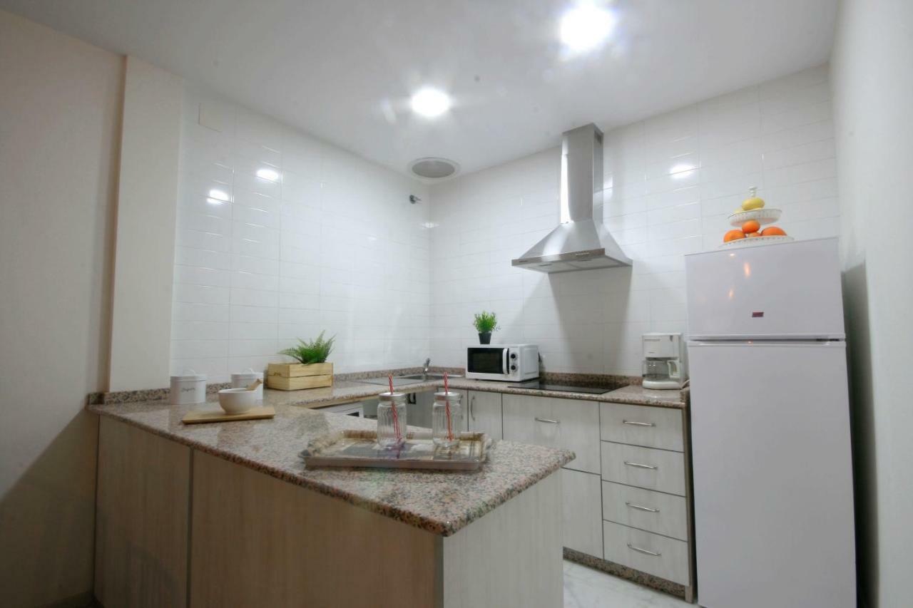 Apartamento Vacacional Carmona Apartment Bagian luar foto